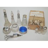 Miscellaneous silver topped glass jars and silver plated items.