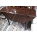 A early Georgian mahogany drop leaf dining table,