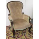 A Victorian mahogany gentleman's open armchair,