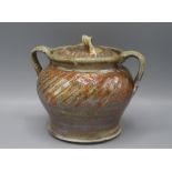 A Jane Hamlyn Studio Pottery twin handled jar and cover, height 16cm, width 19cm.