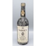 A bottle of Warre's 1975 vintage port, height 29cm.