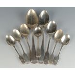 Seven silver fiddle pattern spoons and two Georgian Old English pattern tablespoons. 9.2oz.