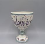 A Laurence McGowan goblet, inscribed 'My love is sweeter than wine', height 14cm.