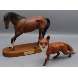 A Beswick horse entitled 'Spirit of Youth', on a wooden plinth base,