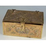 A Cairo Ware brass trinket box, with silver and copper inlay and calligraphy, height 5.