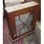 A mahogany glazed wall cabinet, late 19th/early 20th century with a single door, height 68cm,