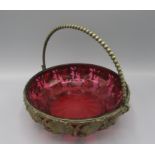 A cranberry glass and gilt metal fruit basket, diameter 19.5cm.