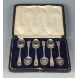 A set of six engraved teaspoons, London 1919, cased. 3oz.