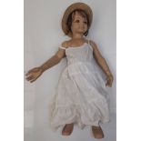 An all composition child shop display dummy, articulated arms and hands, painted features,