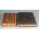 A Victorian satinwood inlaid photo album, decorated with a swallow amongst foliage,