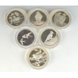 Six Peter Scott 'British Birds' silver medallions by John Pinches, 12.8oz.