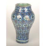 A Persian pottery baluster vase, 19th century, with a polychrome lustre trellis glaze, height 27cm,