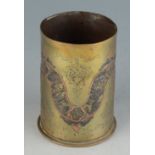 A Cairo Ware trench art brass shell case, inscribed to the base R.M.F.