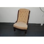 A Victorian mahogany lady's salon armchair,