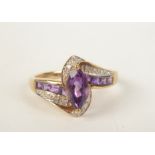 A 9ct gold diamond and amethyst ring.