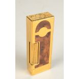 A Dunhill gold plated pipe lighter with briar lacquer, serial number 21767.