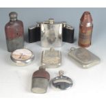 Ten miscellaneous hip flasks, two decorated with hunting scenes.