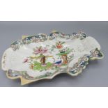 A Mason's patent ironstone china dish, decorated with a bird, vase of flowers and fruit, 28.3 x 18.