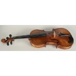 A cased violin and bow, length of back 33.5cm.