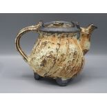 A Ruthanne Tudball cream glazed stoneware teapot, height 15.5cm.