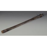 A Kuba tribal sword with copper and bronze inserts to the pierced blade,