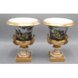 A pair of Sevres style twin handled campana urns, late 19th century,