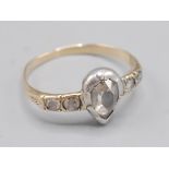 A Georgian style gold ring, the principal stone, a rose cut heart diamond,