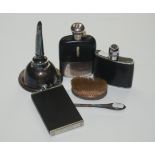A wine funnel, three hip flasks, a silver back brush and a button hook.