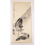 A Japanese pen and ink drawing of peacocks, with calligraphy, 22 x 9.5cm.