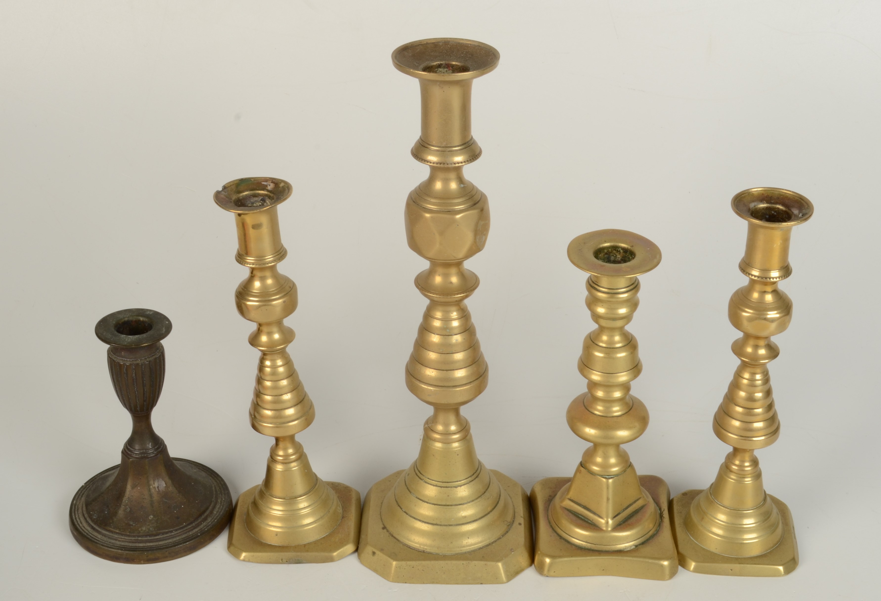 A bronze candlestick, 19th century, height 13.