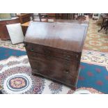 A walnut bureau, 18th century,