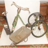 A 1950s child's tricycle, a similar age scooter and a small child's wheelbarrow each damaged.