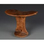 An African tribal headrest, height 14cm, width 19cm.