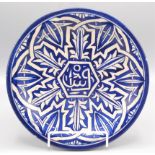 A Persian pottery wall plate, early 20th century, signed to the underside, diameter 24.