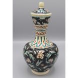 An Iznik pottery baluster vase and cover, 20th century,