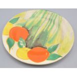 A Clarice Cliff 'Delecia Citrus' Bizarre circular plate, diameter 15.2cm.