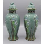A pair of Orion Ware Wood & Sons lidded vases, designed by Frederick Read, decorated with irises,