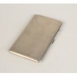 An engine turned silver cigarette case retailed by Dunhill sponsors mark F.F.