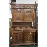 A French carved walnut cabinet, late 19th century,