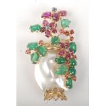 A post war gold brooch in the form of a vase of flowers with a blister pearl and coloured stones.