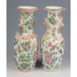 A pair of Chinese Canton porcelain vases, 19th century, height 25.5cm.