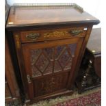 A late Victorian rosewood music cabinet,