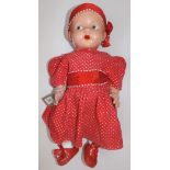 An all composition baby doll by Pedigree, the head with painted flirty eyes, open mouth and tongue,