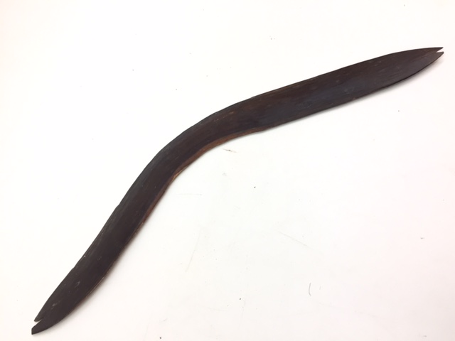 An Australian Aborigine boomerang of plain curved form, width 62cm. - Image 2 of 3