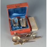 Various silver spoons, forks and a knife 6.2oz. and a pair of 800 standard beakers, boxed.