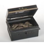 Approximately 149 silver 3d coins in a small cash box.
