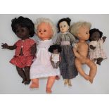 Six various plastic dolls, the largest 19" long.