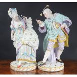 A large pair of French porcelain figures of a courting couple, 19th century,