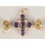 A pair of gold earrings and a gold pendant set amethysts and pearls.