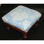 A Victorian oak footstool, with a padded top on turned bun feet, height 17.